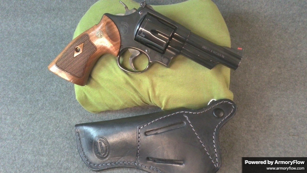 Classic Smith & Wesson Model 29-10 revolver in .44 Magnum with included holster. The iconic N-frame revolver is renowned for its powerful cartridge capability and reliable performance. Well-suited for hunting, sport shooting, or collecting.
