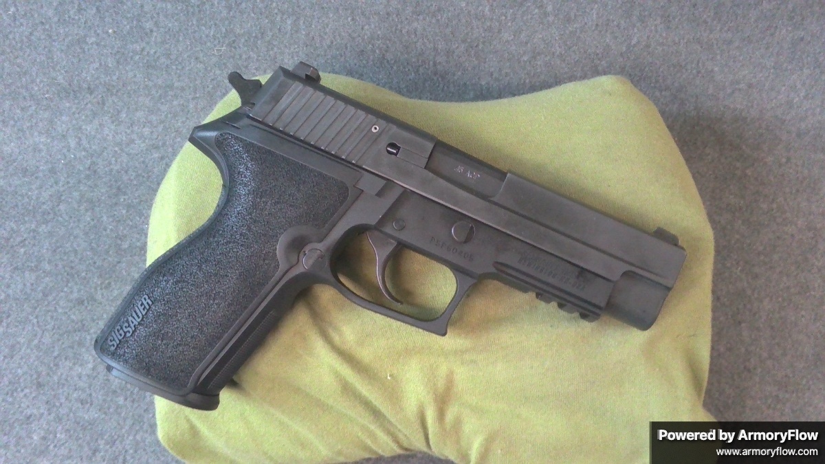 Sig Sauer P227 in .45 ACP, former Pennsylvania police service weapon. Includes original box and extended magazine. Reliable duty-proven semi-automatic pistol with excellent stopping power.